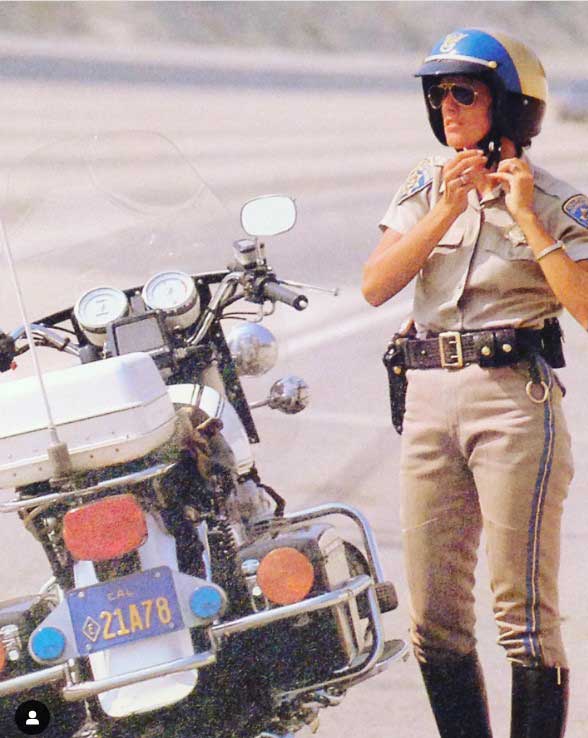 California female police officer with motorcycle