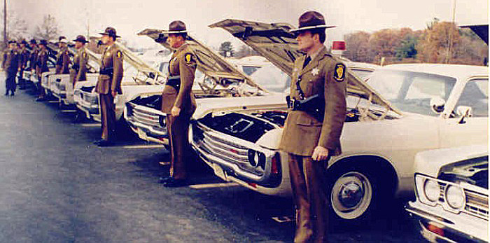 Illinois state police cars and officers